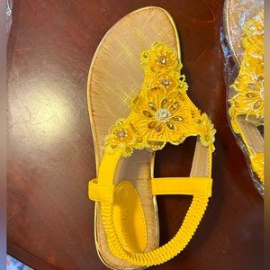 Brand new yellow glitter beaded floral sandals.